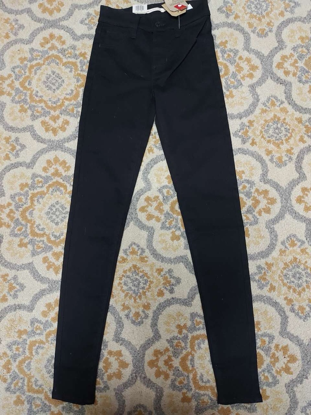 Levi’s black high rise super skinny jeans